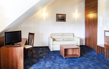 Фото номера Стандартный трехместный номер Отель Hotel Porto г. Плунге 3