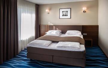 Фото номера Улучшенный одноместный номер Отель Hotel Porto г. Плунге 3