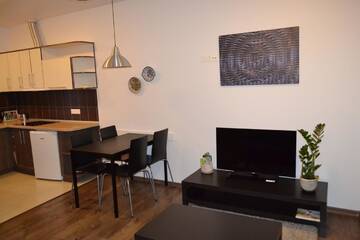 Фото номера Апартаменты с 2 спальнями Апартаменты NG Apartments г. Плунге 3
