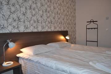 Фото номера Апартаменты с 2 спальнями Апартаменты NG Apartments г. Плунге 13