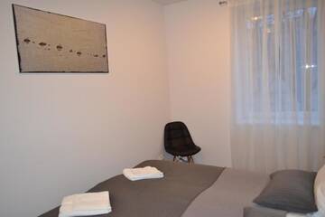 Фото номера Апартаменты с 2 спальнями Апартаменты NG Apartments г. Плунге 22