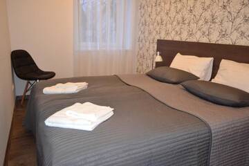 Фото номера Апартаменты с 2 спальнями Апартаменты NG Apartments г. Плунге 23